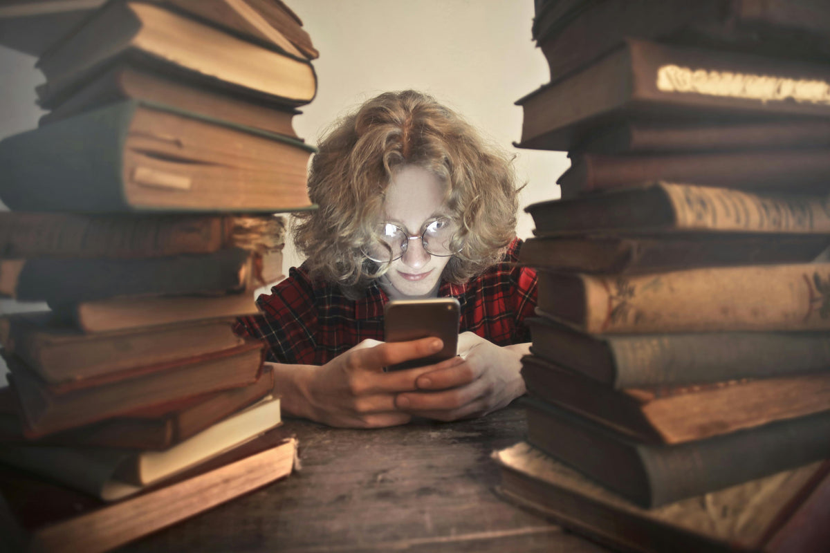 Using Mobile While Reading Which Is Better: Reading on a Phone or a Book? – Reader's Closet