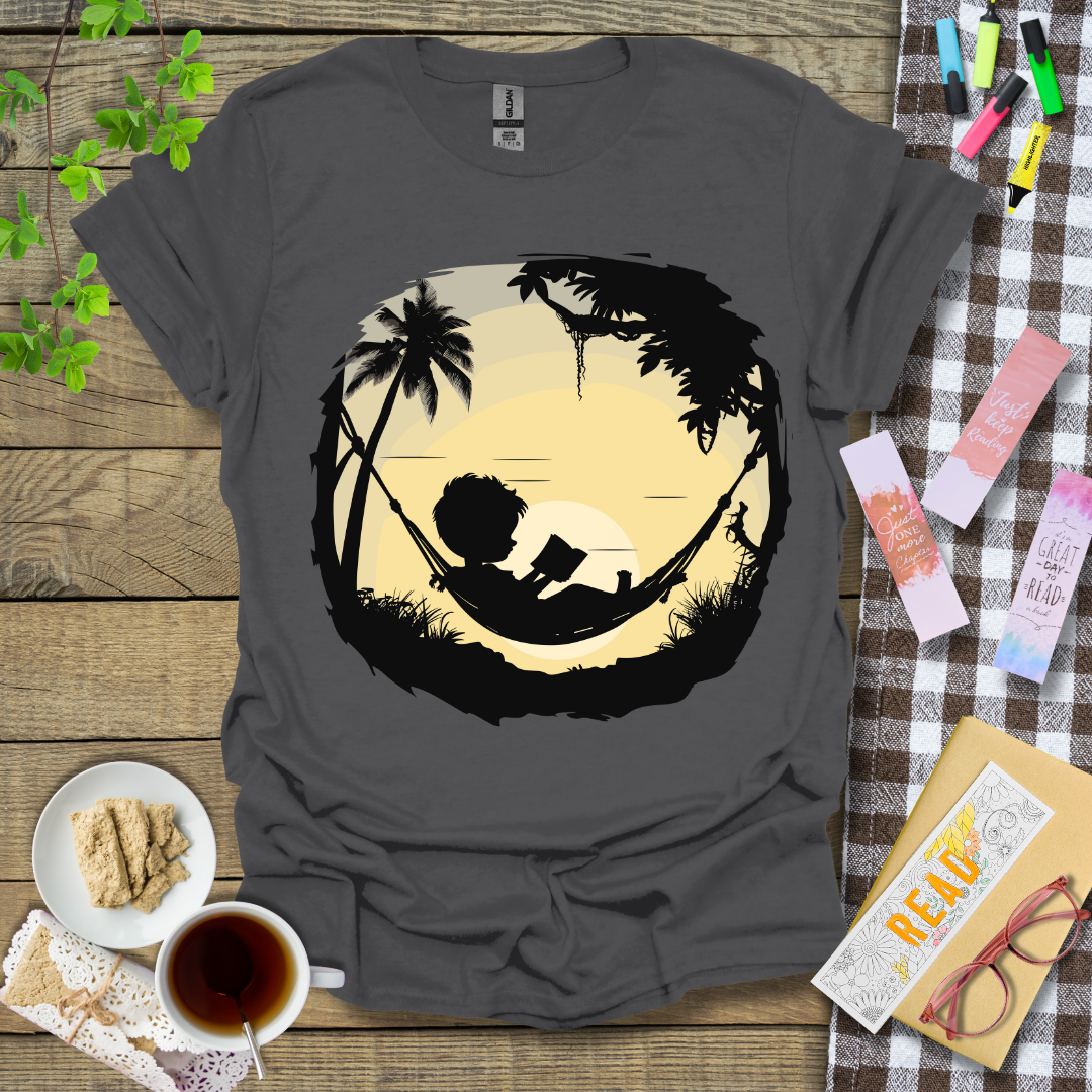 Boy Reading Under A Sunset Graphic T Shirt