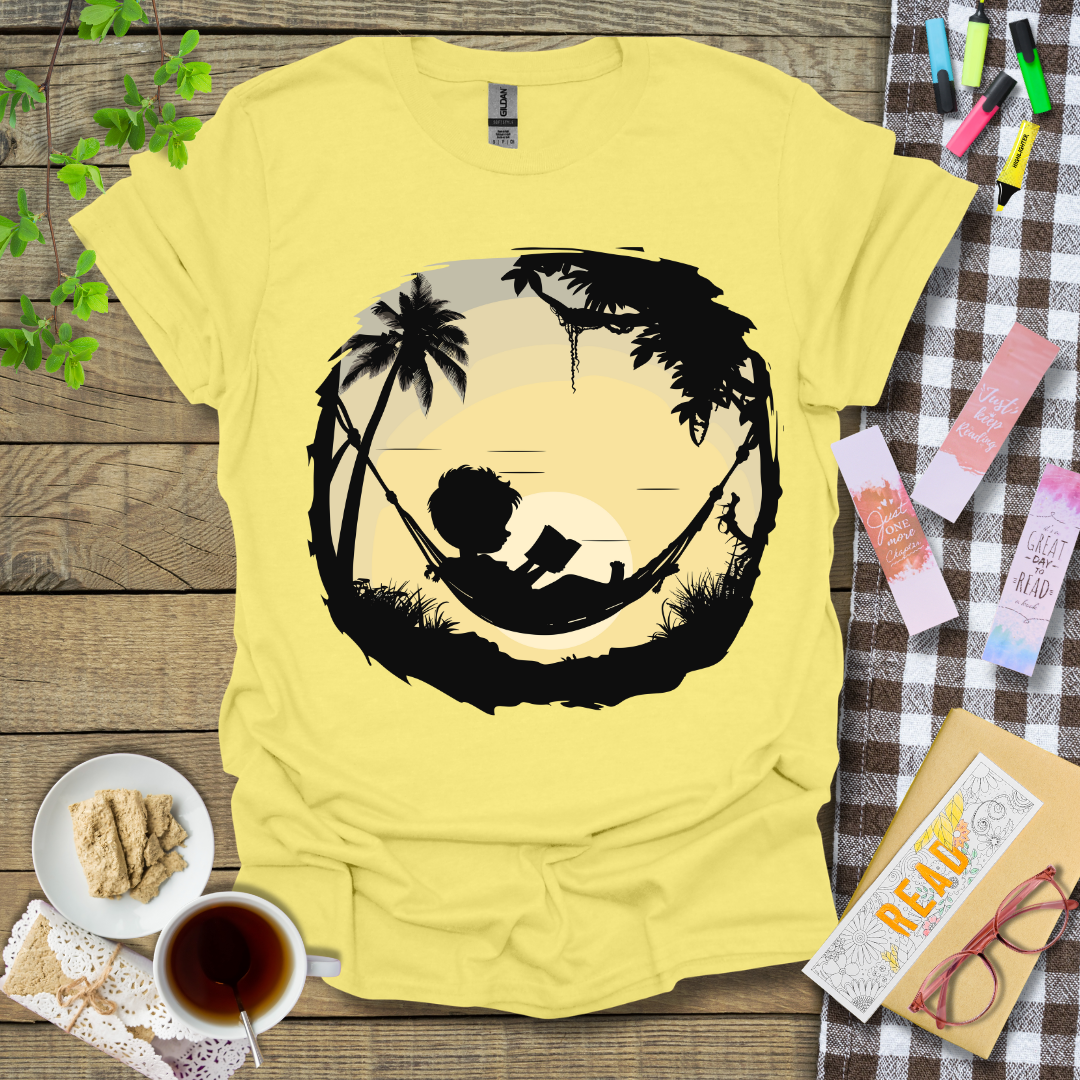 Boy Reading Under A Sunset Graphic T Shirt