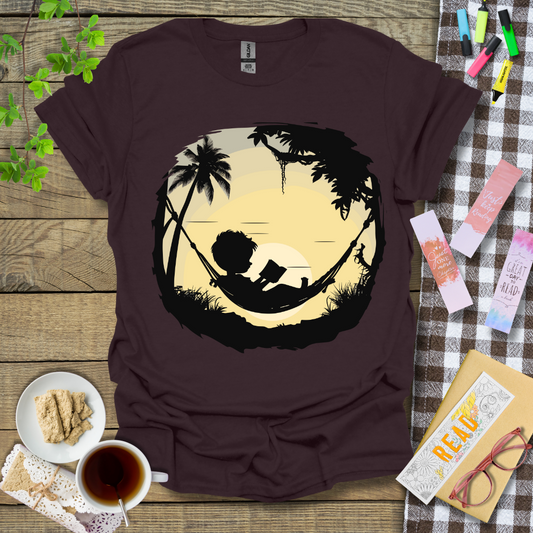 Boy Reading Under A Sunset Graphic T Shirt