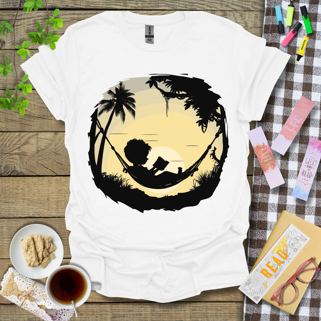 Boy Reading Under A Sunset Graphic T Shirt